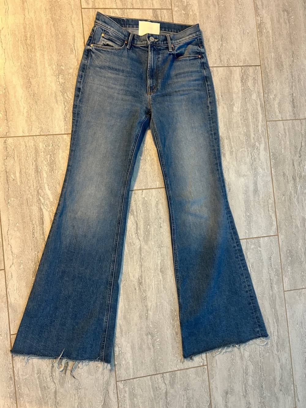 Mother High-Rise Wide-Leg Flare Jeans with raw hem. Perfect for summer!